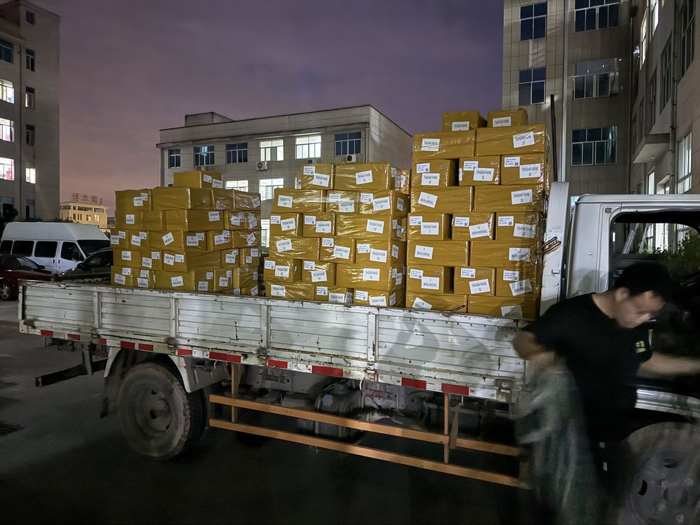 LOCACRYSTAL Pujiang night-shift truck shipment leaving the factory loaded with sealed rhinestone trim cartons