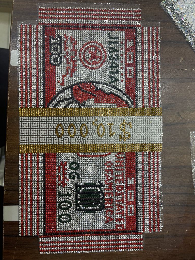 flat rhinestone crystal mesh panel cut to a clutch face with a banknote design