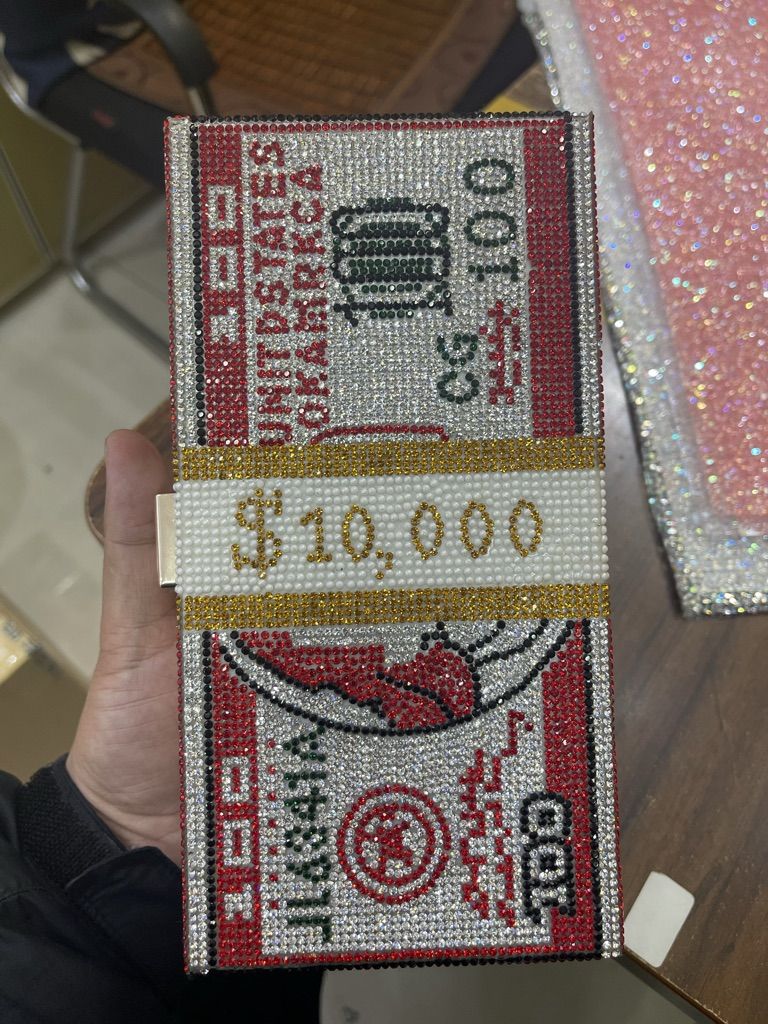 rhinestone crystal mesh clutch front with a banknote motif
