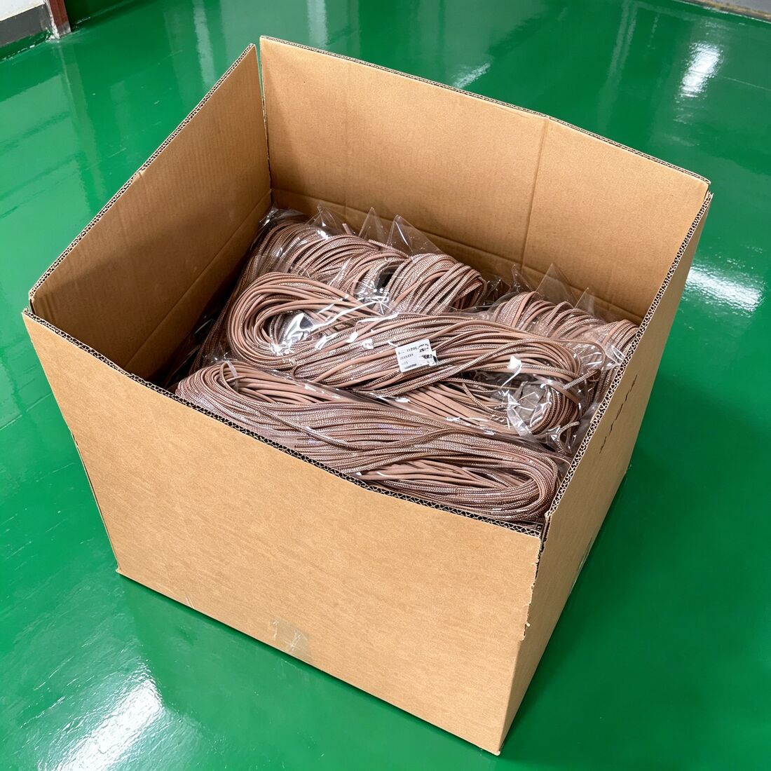 Diamond Rope copper-tone bundle prepared in carton, ready for shipment
