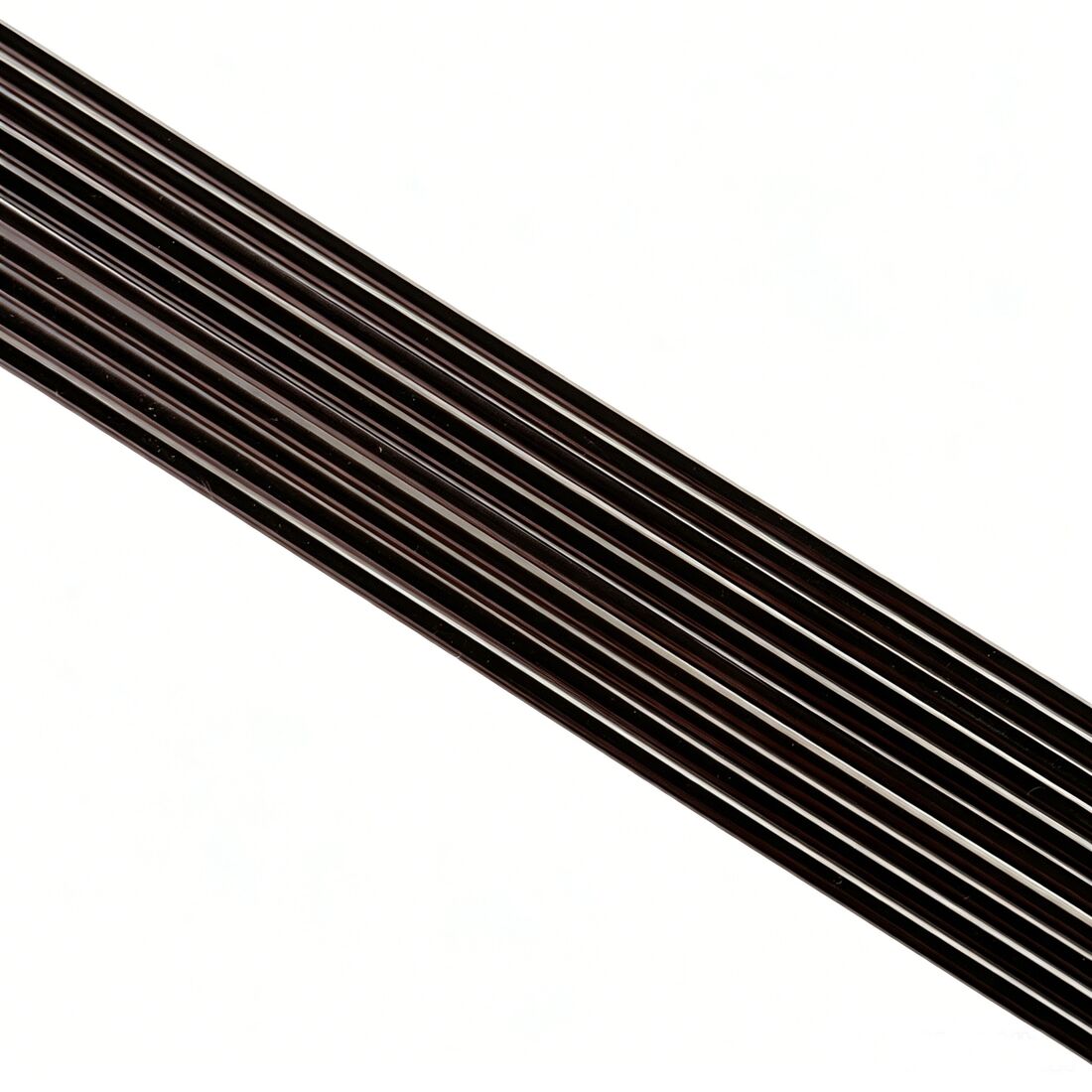 Dark bronze PVC strip close-up showing the extruded surface used to frame rhinestone panels