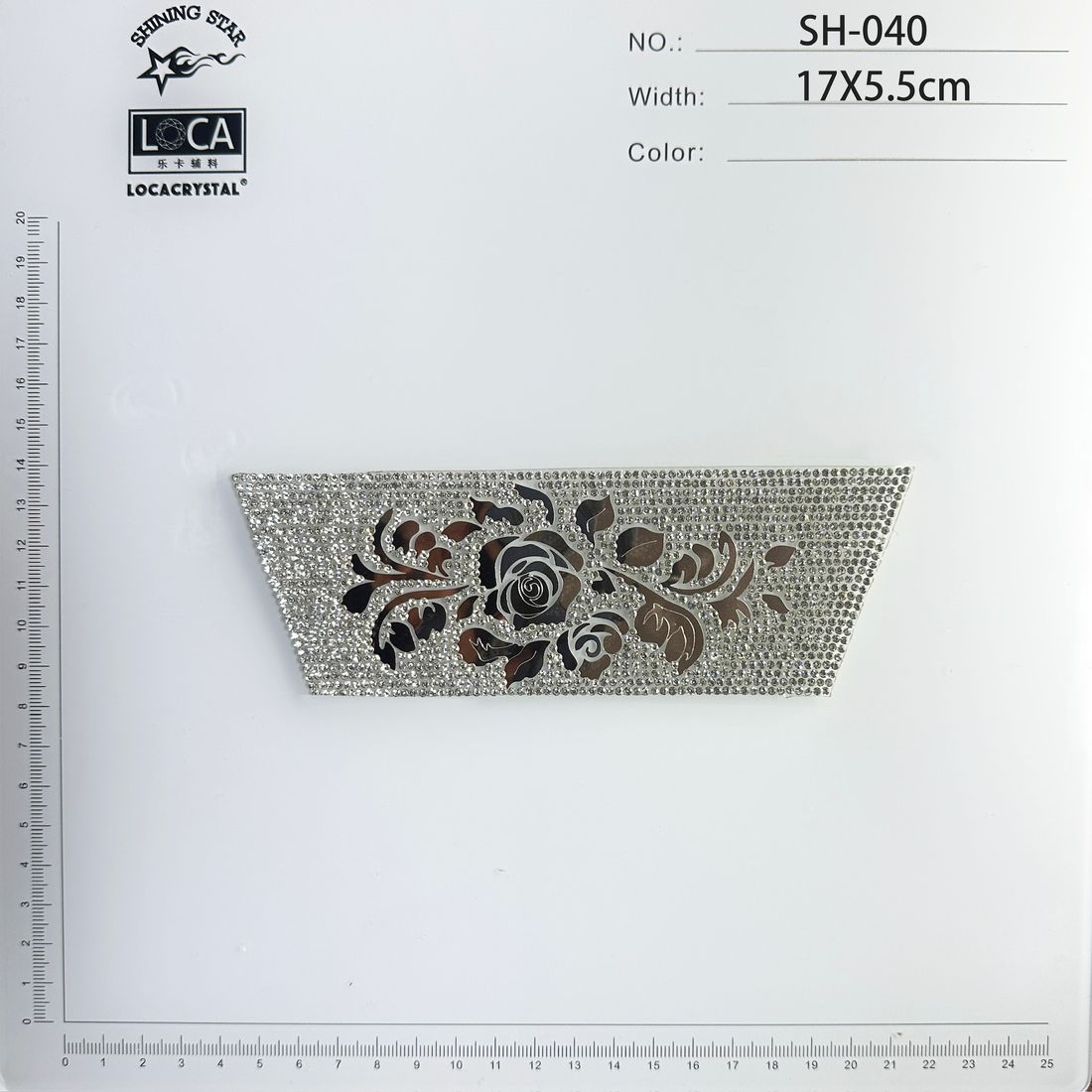 A rhinestone Diamond Patch with a directional rose motif