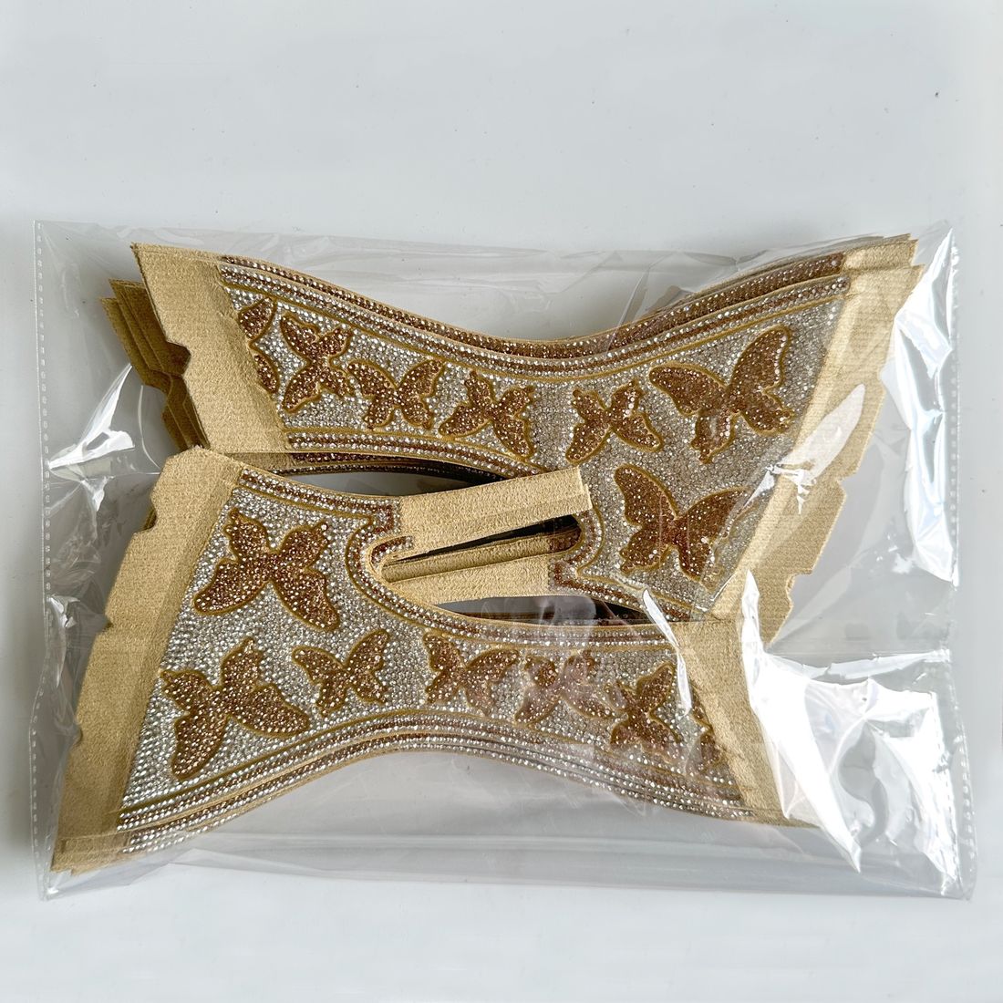 LOCACRYSTAL Shoe Upper gold butterfly motif vamp band in clear retail pouch — ready-to-ship pair packaging